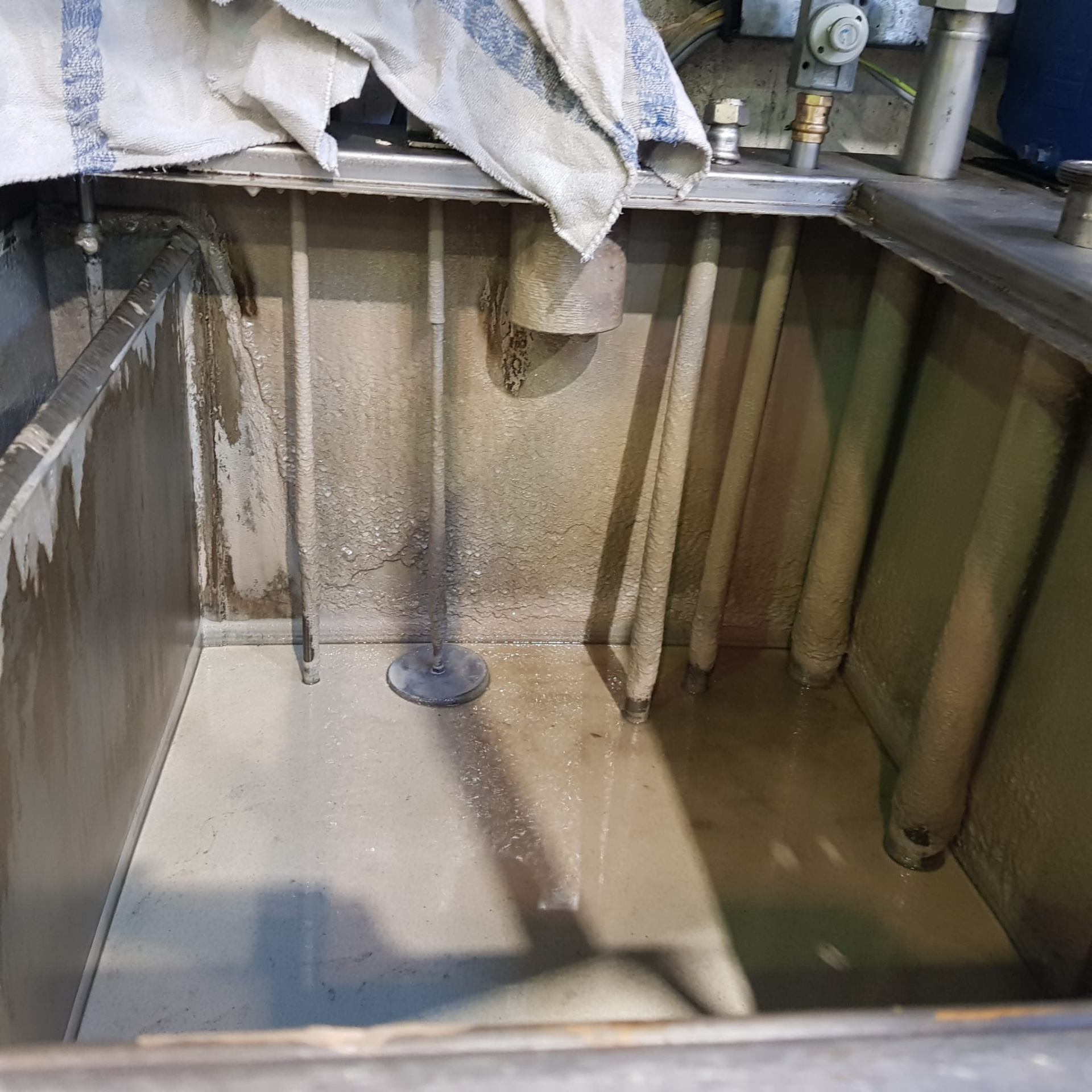 Kühlschmierstoff-Wechsel an einer CNC-Maschine